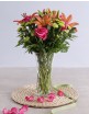 Mothers Day lilies and roses in a vase