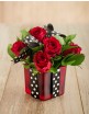 Red Roses tied up in square glass vase